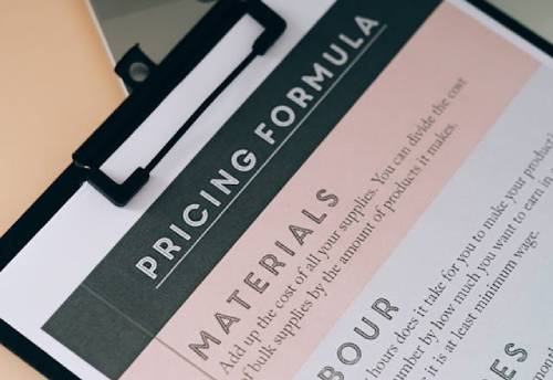 Clipboard with a quote for plumbing services, showcasing transparent pricing